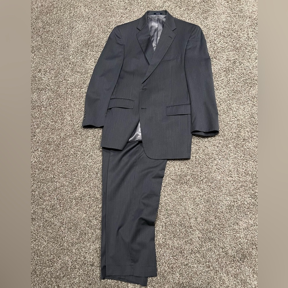 Hart Schaffner Marx double vent 2 button suit. Charcoal gray with stripes